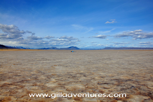 Alvord Desert with  person supine at horizon